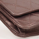 Portefeuille sur chaîne (WOC) 2.55 Reissue en cuir de veau métallisé vieilli matelassé violet Chanel