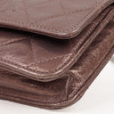 Portefeuille sur chaîne (WOC) 2.55 Reissue en cuir de veau métallisé vieilli matelassé violet Chanel