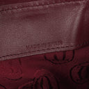 Petit sac seau en cuir bordeaux Must De Cartier
