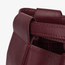 Petit sac seau en cuir bordeaux Must De Cartier