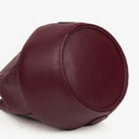Petit sac seau en cuir bordeaux Must De Cartier