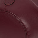 Petit sac seau en cuir bordeaux Must De Cartier