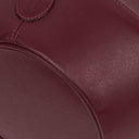 Petit sac seau en cuir bordeaux Must De Cartier