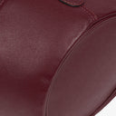 Petit sac seau en cuir bordeaux Must De Cartier