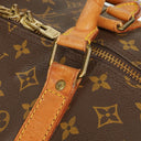 Sac de voyage Louis Vuitton Keepall 60 à bandoulière en toile Monogram
