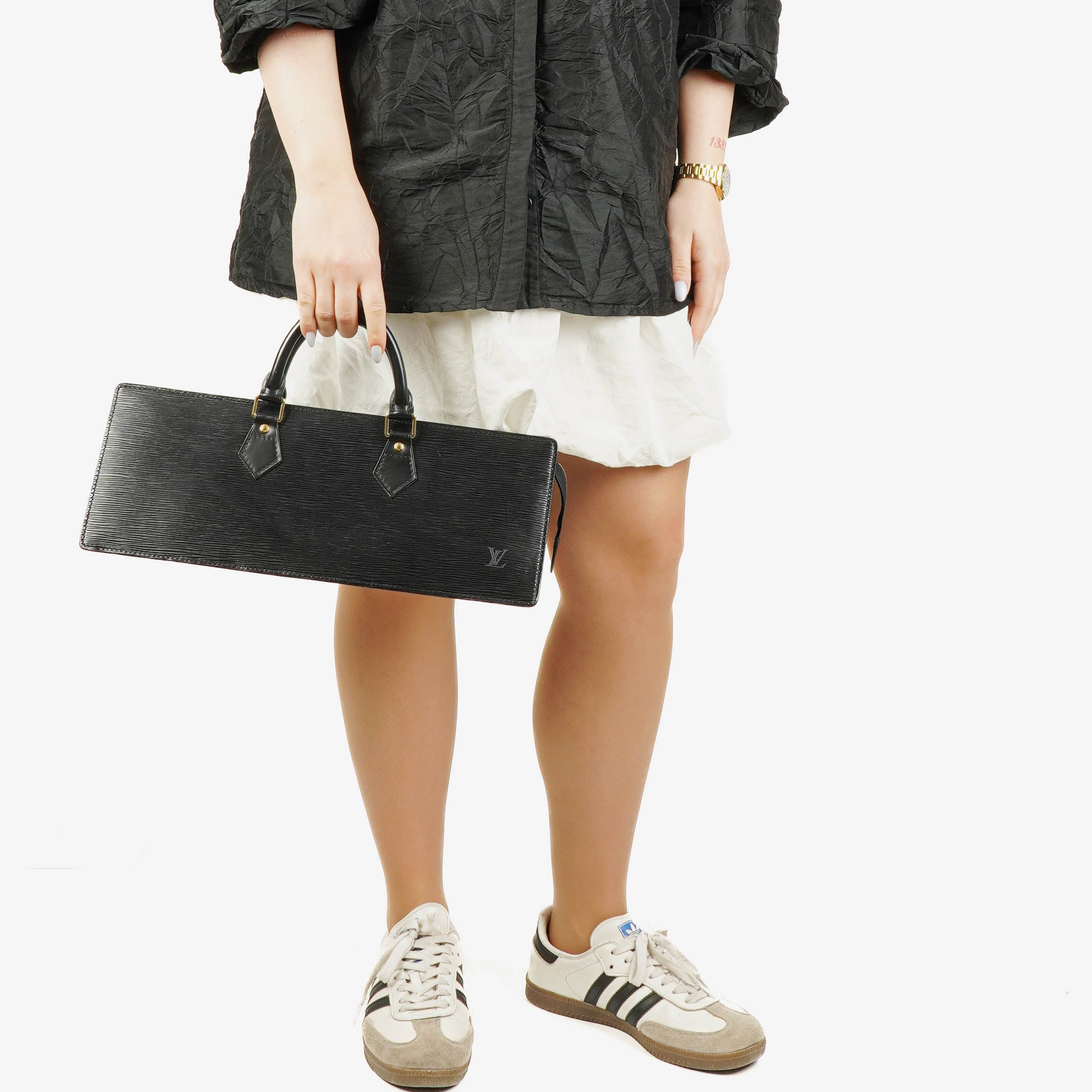 Sac Louis Vuitton Sac Triangle en cuir EPI noir