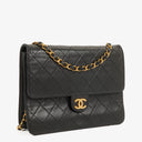 Chanel Small Classic Single Flap Bag Black Quilted Lambskin With 24K Gold-Plated Hardware