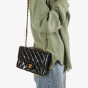 Chanel Single Flap Bag Black Quilted Patent Leather With 24K Gold-Plated Hardware
