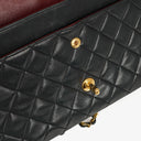 Chanel Vintage Classic Medium Double Flap Bag in Quilted Black Lambskin with 24-karat Gold-Plated Hardware