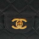 Chanel Vintage Classic Medium Double Flap Bag in Quilted Black Lambskin with 24-karat Gold-Plated Hardware