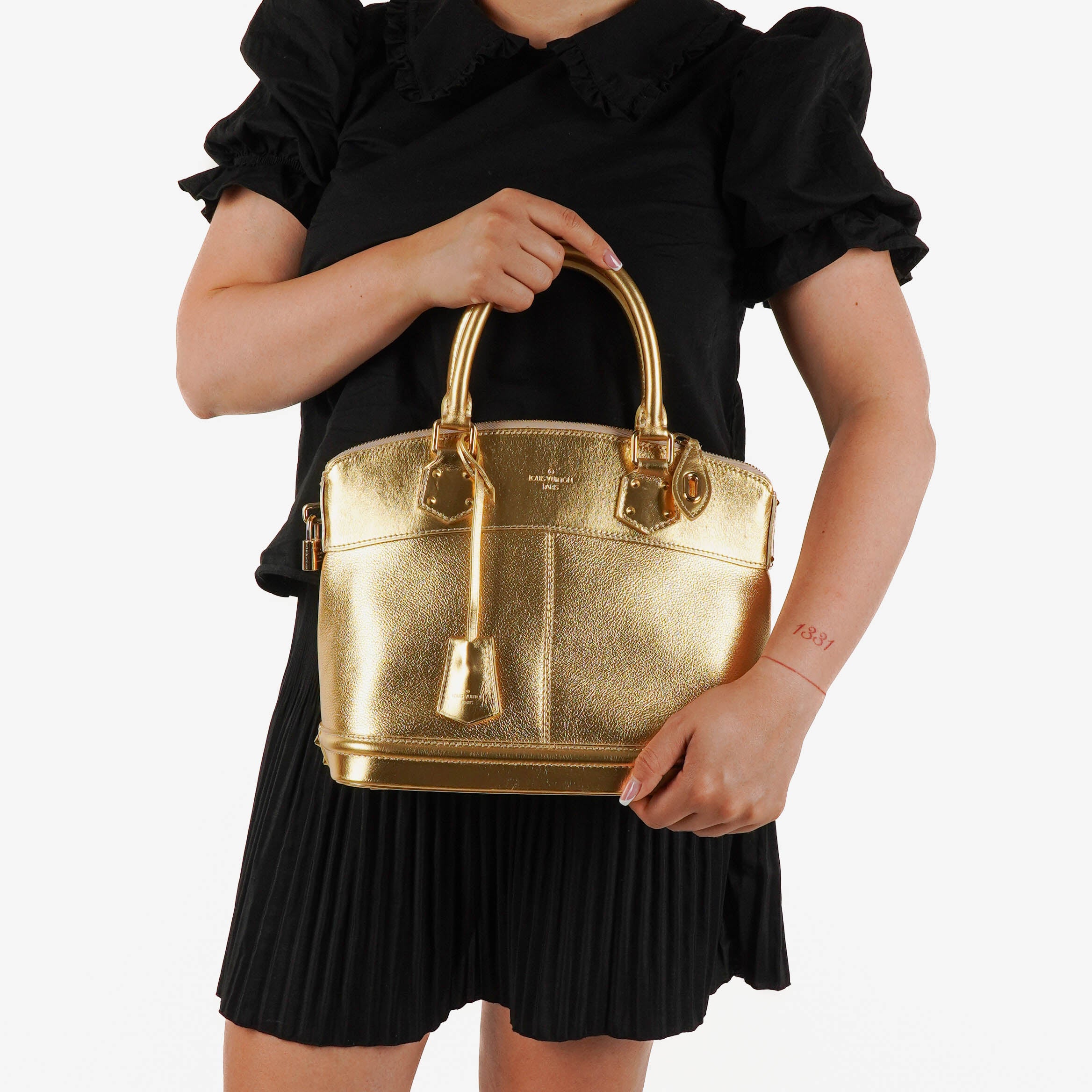 Louis Vuitton Lockit Suhali Gold Leather Bag