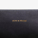 Sac à rabat demi-lune classique Chanel en agneau blanc