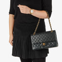 Chanel Vintage Classic Medium Double Flap Bag in Quilted Black Lambskin with 24-karat Gold-Plated Hardware