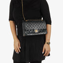 Chanel Vintage Classic Medium Double Flap Bag in Quilted Black Lambskin with 24-karat Gold-Plated Hardware