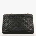 Chanel Maxi CC Classic Single Flap Maxi Logo Bag Black Quilted Lambskin 24K Gold-Plated Hardware