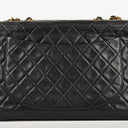 Chanel Maxi CC Classic Single Flap Maxi Logo Bag Black Quilted Lambskin 24K Gold-Plated Hardware