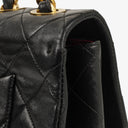 Chanel Maxi CC Classic Single Flap Maxi Logo Bag Black Quilted Lambskin 24K Gold-Plated Hardware
