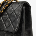 Chanel Maxi CC Classic Single Flap Maxi Logo Bag Black Quilted Lambskin 24K Gold-Plated Hardware