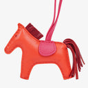 Hermes Rodeo Horse PM Grigri Bag Charm In Rouge Indien, Rubis, Rose Mexico Milo Lambskin