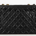 Chanel Maxi CC Classic Single Flap Maxi Logo Bag Black Quilted Lambskin 24K Gold-Plated Hardware