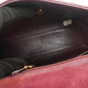 Sac à rabat vintage en daim matelassé bordeaux avec ferrures plaquées or 24K Chanel