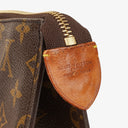 Louis Vuitton Sac Triangle Monogram Handbag