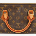 Louis Vuitton Sac Triangle Monogram Handbag