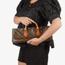 Louis Vuitton Sac Triangle Monogram Handbag