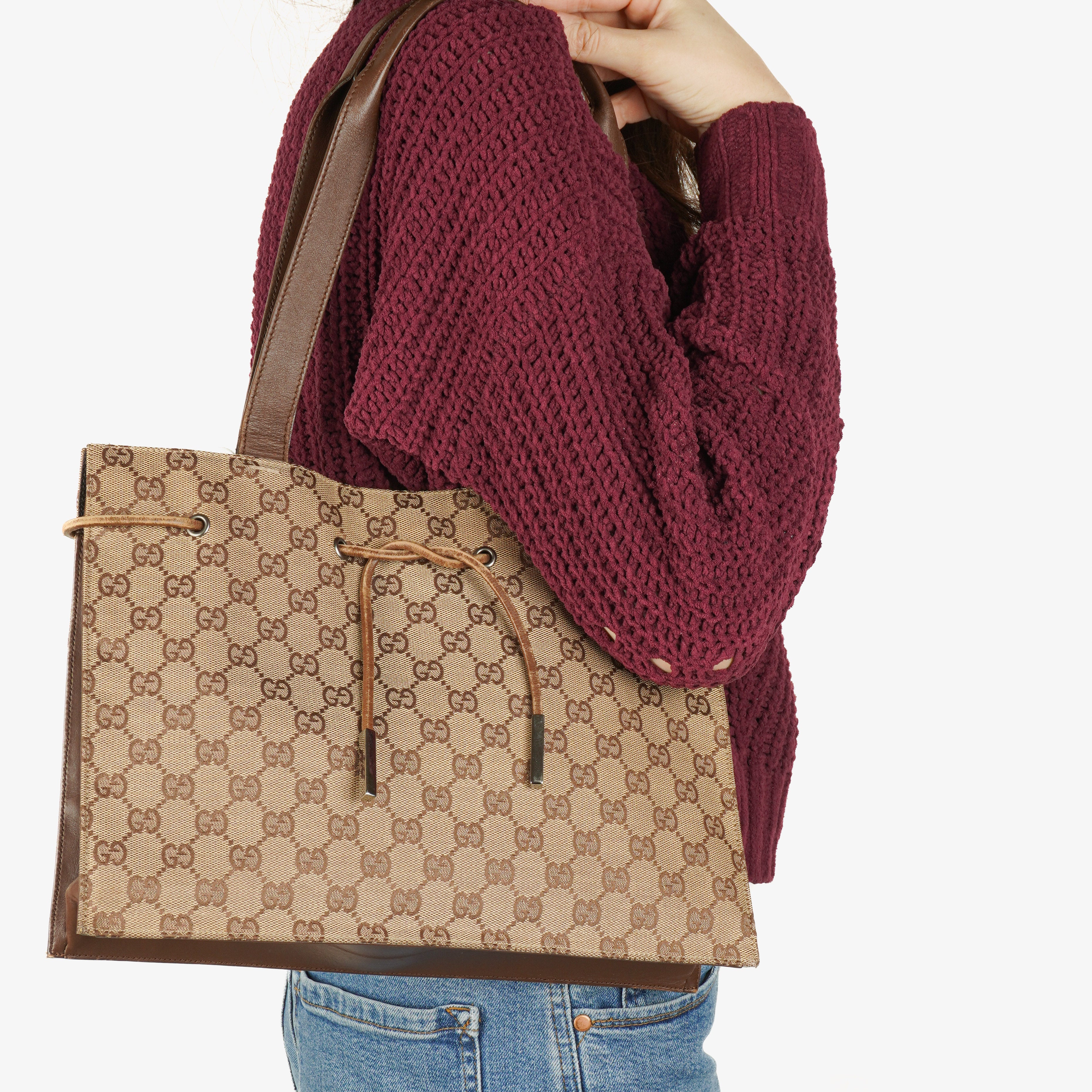 Gucci Brown Monogram Drawstring Bag