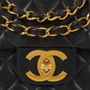 Chanel Maxi CC Classic Single Flap Maxi Logo Bag Black Quilted Lambskin 24K Gold-Plated Hardware