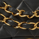 Chanel Maxi CC Classic Single Flap Maxi Logo Bag Black Quilted Lambskin 24K Gold-Plated Hardware