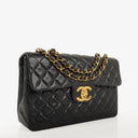 Chanel Maxi CC Classic Single Flap Maxi Logo Bag Black Quilted Lambskin 24K Gold-Plated Hardware