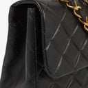 Chanel Maxi CC Classic Single Flap Maxi Logo Bag Black Quilted Lambskin 24K Gold-Plated Hardware