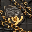 Chanel Maxi CC Classic Single Flap Maxi Logo Bag Black Quilted Lambskin 24K Gold-Plated Hardware