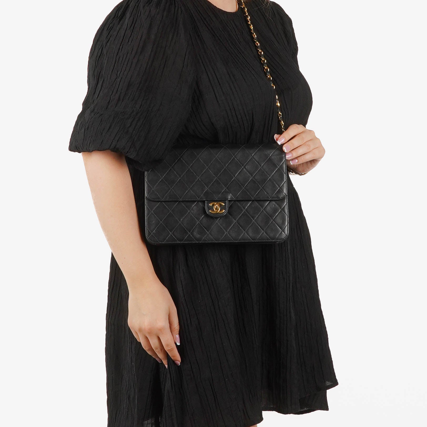 Chanel Classic Black Quilted Lambskin Single Flap Bag With 24K Gold-Plated Hardware
