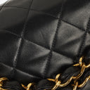 Chanel Maxi CC Classic Single Flap Maxi Logo Bag Black Quilted Lambskin 24K Gold-Plated Hardware