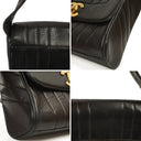 Chanel Maxi Logo Crossbody Flap Bag Black Vertical Quilted Lambskin 24K Gold-Plated Hardware