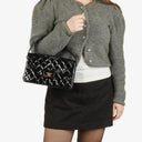 Chanel Black Double-Sided Flap Bag In Quilted Patent Leather