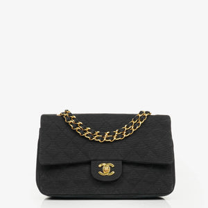 Sac Chanel noir matelassé à double rabat
