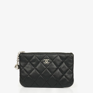 Petite trousse cosmétique Cosmo en agneau matelassé noir Chanel