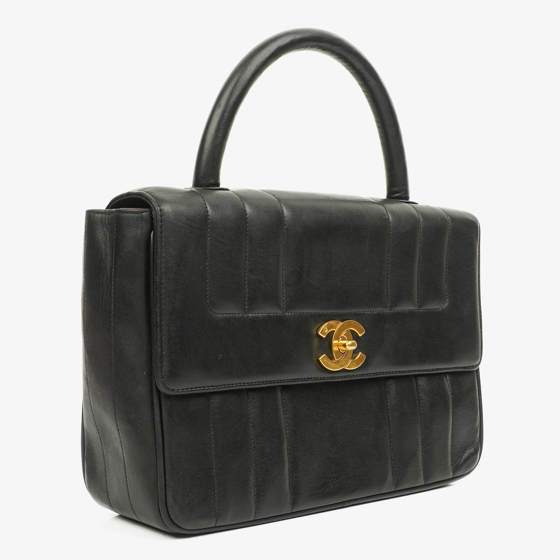 Chanel Kelly Black Vertical Quilted Lambskin Flap Bag With 24K Gold-Plated Hardware