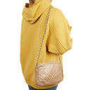 Chanel Camera Tassel In Beige Quilted Lambskin