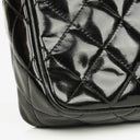 Chanel CC Black Quilted Patent Leather Camera Tassel Bag