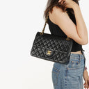 Chanel Classic Black Quilted Lambskin Double Flap Bag With 24K Gold-Plated Hardware