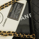 Chanel Classic Black Quilted Lambskin Double Flap Bag With 24K Gold-Plated Hardware