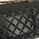 Chanel Classic Black Quilted Lambskin Double Flap Bag With 24K Gold-Plated Hardware