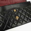 Chanel Classic Black Quilted Lambskin Double Flap Bag With 24K Gold-Plated Hardware