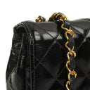 Chanel Classic Maxi Logo Full Flap Bag Black Quilted Patent Leather With 24K Gold-Plated Hardware