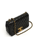 Chanel Classic Maxi Logo Full Flap Bag Black Quilted Patent Leather With 24K Gold-Plated Hardware