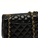 Chanel Classic Maxi Logo Full Flap Bag Black Quilted Patent Leather With 24K Gold-Plated Hardware